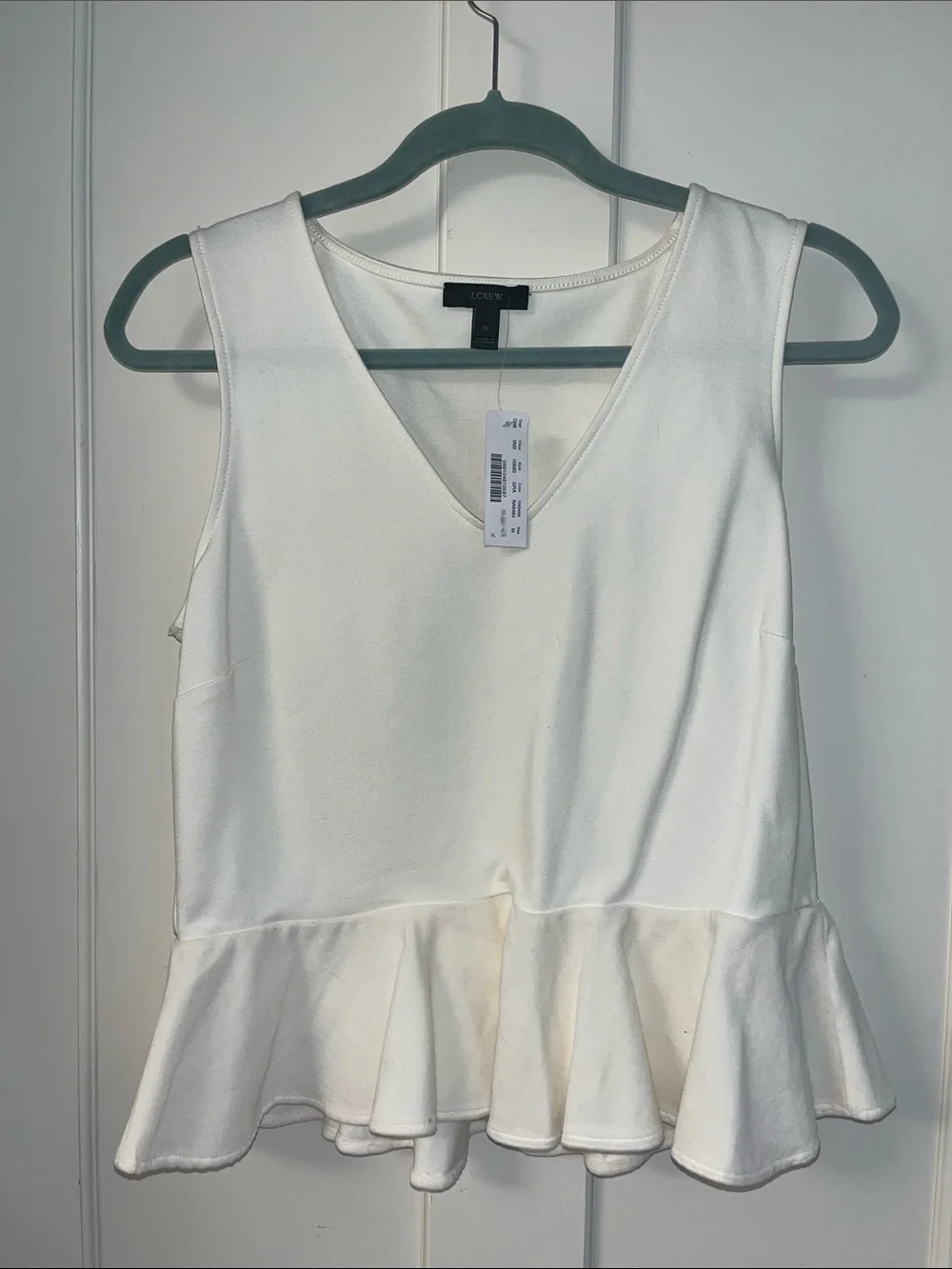 J. Crew Ivory Sleeveless V-Neck Peplum Top